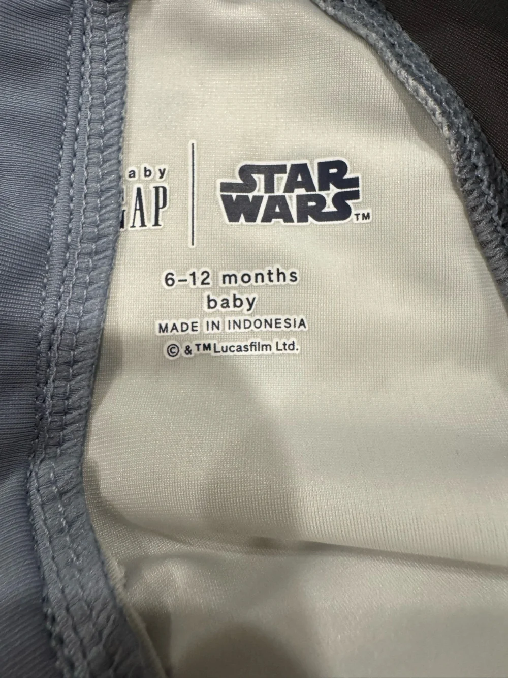 Like-new GAP x Star Wars one-piece rash guard swimsuit in size 6–12 months
